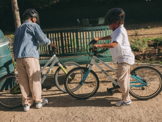 Biky single-speed and geared kids bikes with young riders 