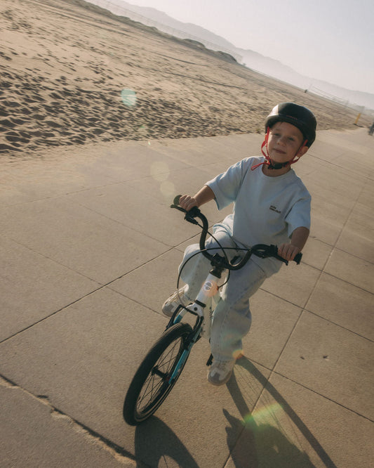 Child riding a Biky kids bike with hand brakes 